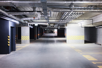 Underground car parking garage in modern apartment house