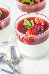 Italian dessert panna cotta with strawberries