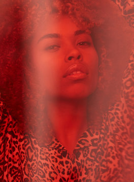 Amazing woman portrait behind red filter
