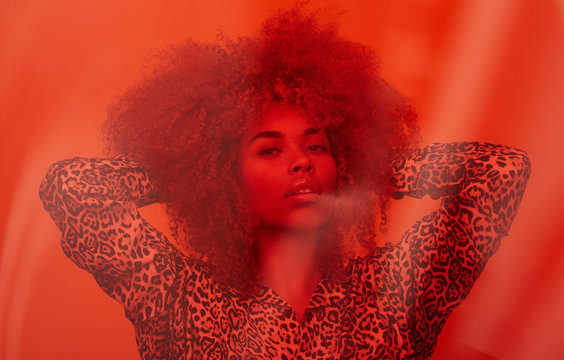 Amazing woman portrait behind red filter