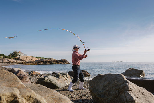Active Senior Lifestyle Video of Man Fishing From shore