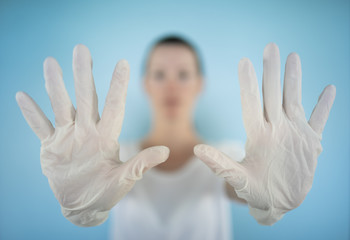 woman wearing cleaning gloves