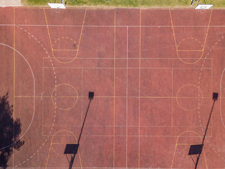 Aerial view of empty basketball court with two fields.