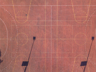 Aerial view of empty basketball court with two fields. Concept of team sport and leisure activity.