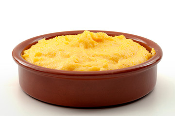 Healthy eating, vegetarian food and nutritious maize gastronomy concept with corn polenta in...