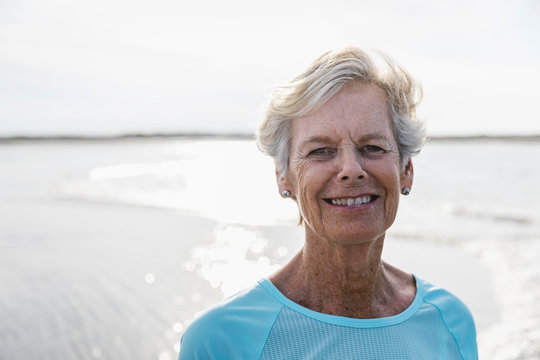 Face of Active Senior Woman Walking on Beach