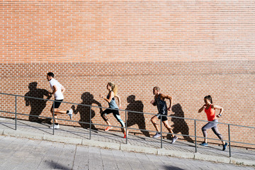 Athletes running in the street