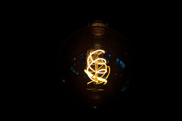 art of lighting of incandescent bulb. Close