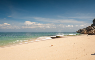 Beach and beautiful views of the cliffs, splashing waves and nature.