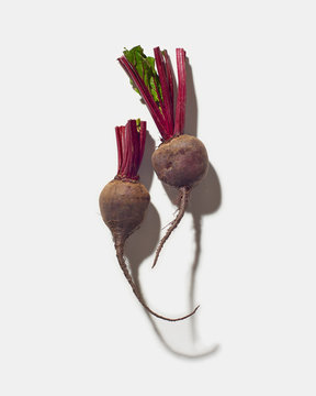Two Trimmed beets on white