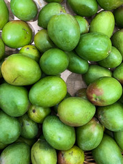 lots of delicious ripe green avocados for eating the background