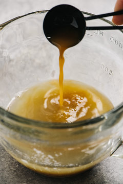 Adding measured liquid ingredients into a recipe