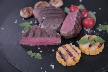 grilled meat grilled vegetables corn