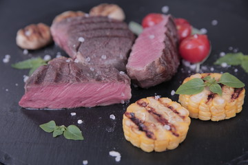 grilled meat grilled vegetables corn