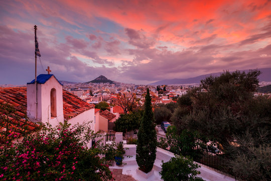 View of Lycabettus hill from Anafiotika neighborhood in Athens.