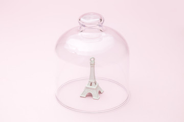 Paris in quarantine coronavirus covid-19 isolation abstract made of Eiffel Tower covered with glass cover.