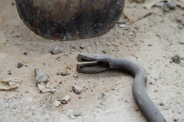 repair inside the apartment high-rise building. Spade and scrap are needed for garbage collection....