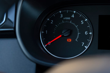 Fototapeta premium handbrake icon on the dashboard. Modern light car mileage