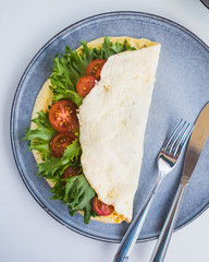 scrambled eggs with tomatoes herbs