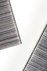 Abstract image composed of two office staples slats