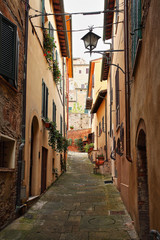 Fototapeta na wymiar Beautiful Italian street of small old provincial town