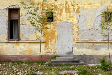 Abandoned old house with faded paint