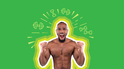 athletic african american male winner holds fists clenched on green background