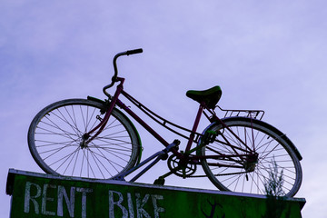 bike as a sign shop for a bicycle rental service store