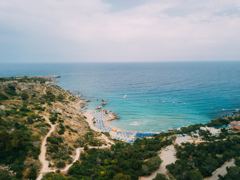 Pissouri. Cyprus Republic. Pissouri beach in a sunny day panorama from a drone.