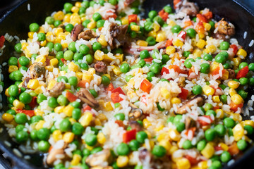 Fry vegetables in a pan. A mixture of different vegetables.