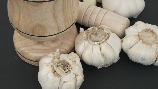 Garlic and wood garlic crusher on 360 degree rotating stand,