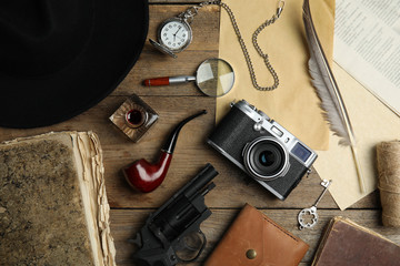 Composition with different vintage items on wooden background. Detective layout