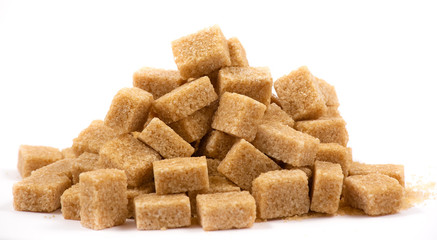 Brown sugar in a wooden bowl or wooden spoon Sugar for health Use for cooking or desserts on white and sugar backgrounds.
