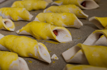 Raw dough with cherries and icing for making cookies