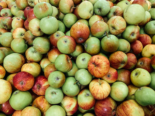 lots of delicious ripe apples for healthy food like the background