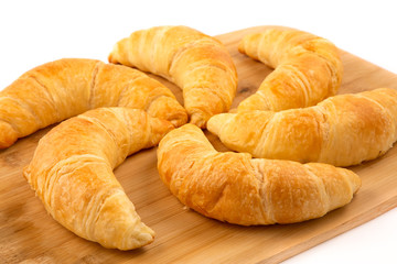 Croissant bread of bake Breakfast in the morning for health or diet food in Wooden tray on the white background