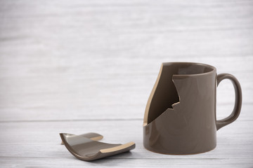 Broken Plate or broken glass and dish on the on the floor in the kitchen The concept of accidents...