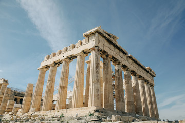 Parthenon antique temple with columns and blue sky on Acropolis of Athens Greece