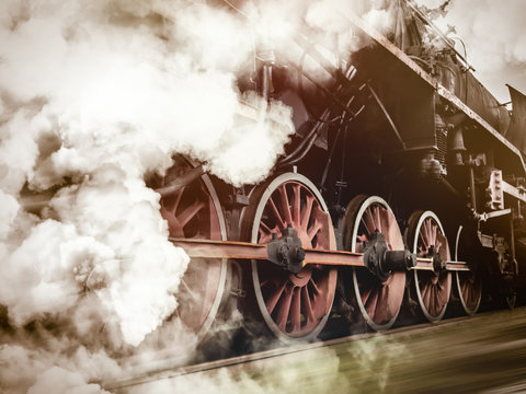vintage trains with a steam on the move