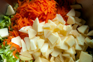 fresh salad of carrot and cabbage apples