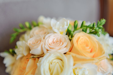 Obraz na płótnie Canvas close-up obouquet of roses and freesiaclose-up of a bouquet of roses and freesia