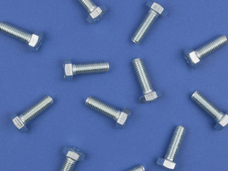 Bolts closeup on blue background.