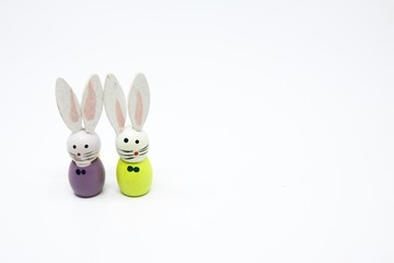 Cute little wooden figurines of an Easter bunnies