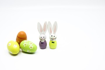 Cute little wooden figurines of an Easter bunnies