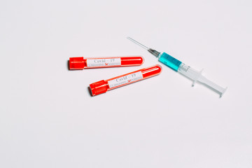 The vaccine for Coronavirus. Positive blood Tests for Coronavirus in test tubes.