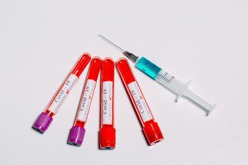 The vaccine for Coronavirus. Positive blood Tests for Coronavirus in test tubes.