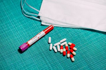 The vaccine for Coronavirus. Positive blood Tests for Coronavirus in test tubes.