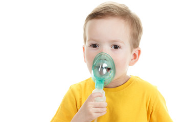Asthma patient, children boy diagnosis asthma inhalation therapy the mask of inhaler. Close up a...