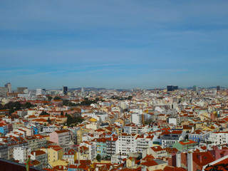 Lisbon city skyline with red roofs.