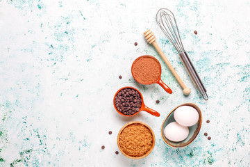 Cupcake baking background with kitchen utensils.